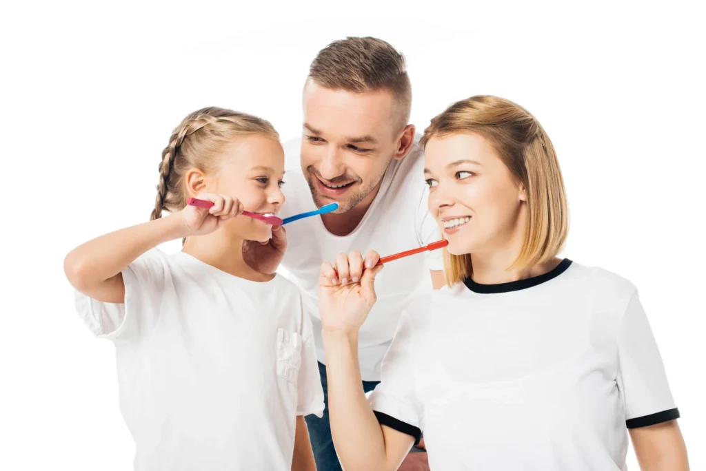 Family-brushing-teeth-before-seeing-a-family-dentist-in-Nashville-TN